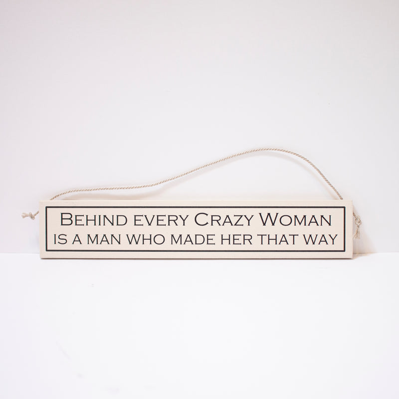 "Behind Every Crazy Women Is A Man Who Made Her That Way" Sign